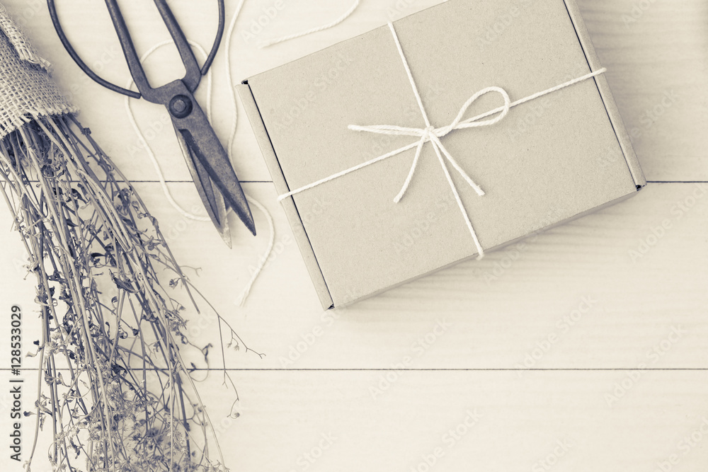 Gift boxes on the white wood,Cardboard boxes tied with string wh Gift boxes on the white wood,Cardboard boxes tied with string wh