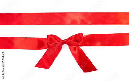 Red horizontal gift ribbons and luxurious bow