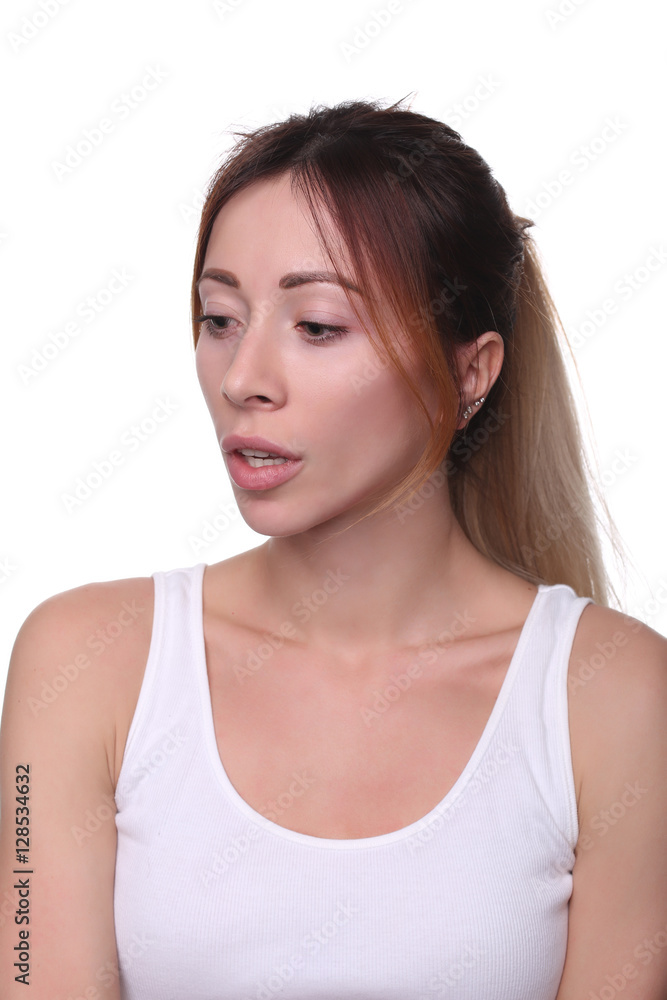 Red-haired girl in tanktop. Close up. White background Red-haired girl in tanktop. Close up. White background