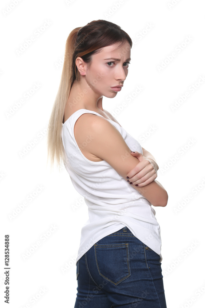 Girl in jersey standing profile. Close up. White background Girl in jersey standing profile. Close up. White background