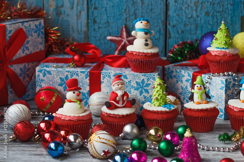 Christmas cupcakes with colored decorations © lisssbetha