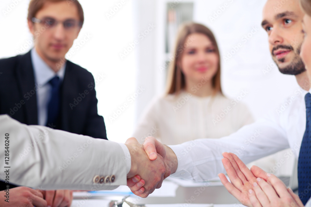 custom made wallpaper toronto digitalClose up of  two business man shaking hands to each other finishing up the meeting