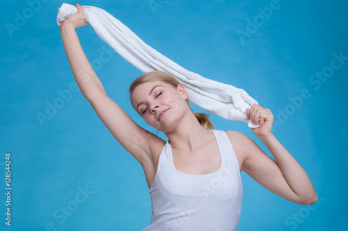 Woman with a towel above her head
