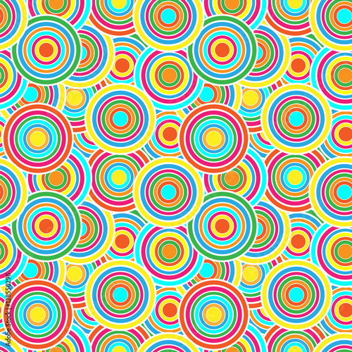 Red  yellow and blue circles seamless vector pattern. 