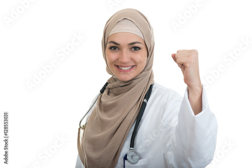 Closeup portrait of friendly, smiling confident Muslim female doctor celebrating success