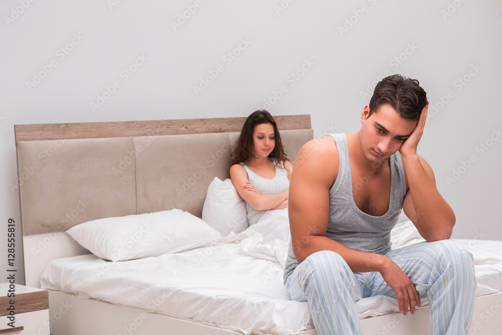 Family conflict with wife and husband in bed