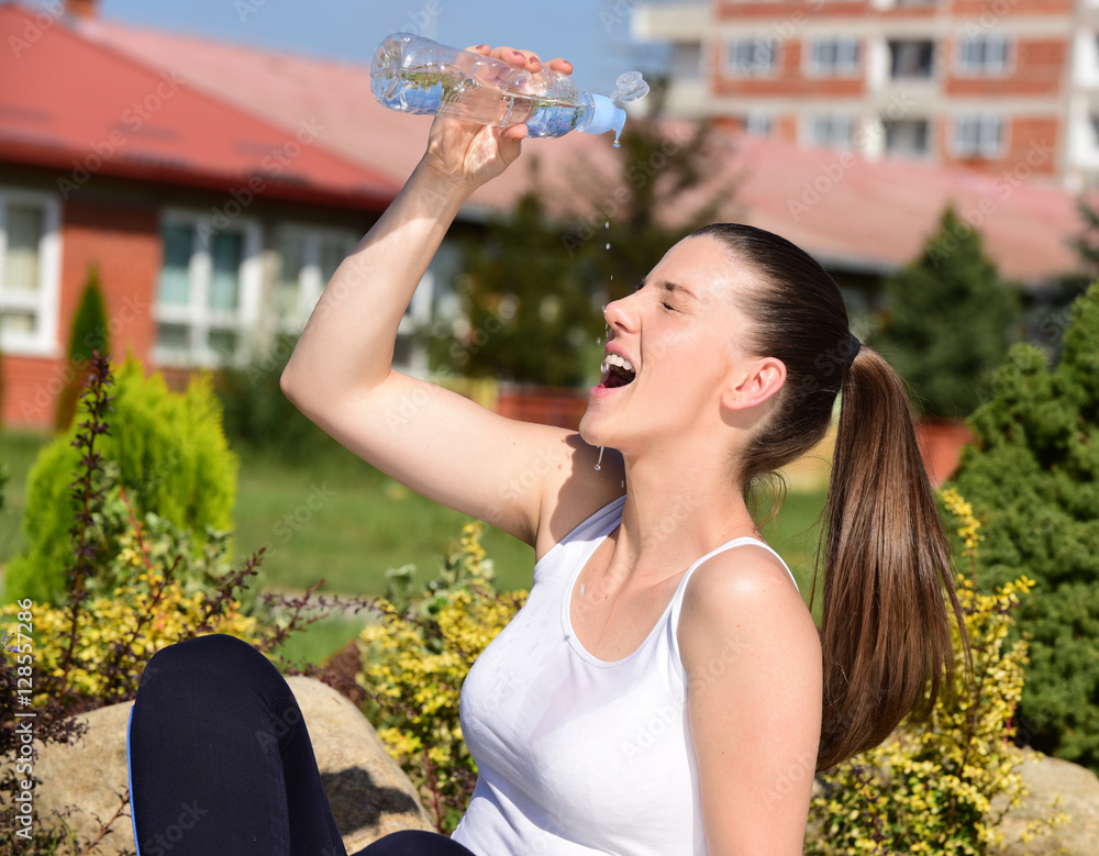 Training fitness woman doing plank core exercise working out for back spine and posture outdoors in park. 