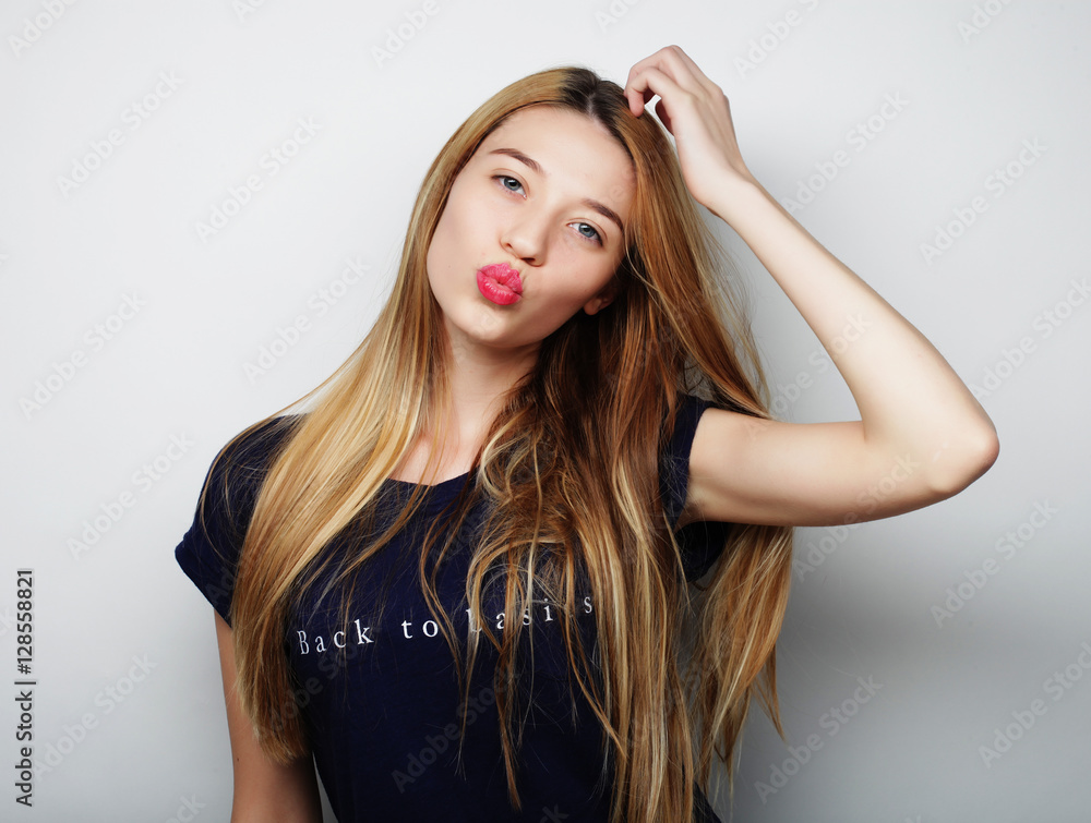 Fototapeta premium Young cute smiling blond girl