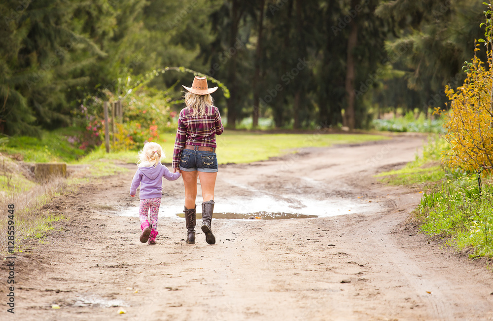 Beautiful elegance back woman cowgirl, riding a horse wearing bl Beautiful elegance back woman cowgirl, riding a horse wearing bl