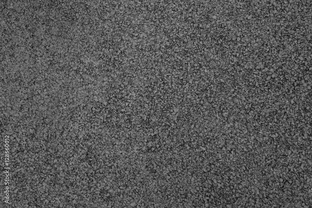 Asphalt background texture with some fine grain Asphalt background texture with some fine grain