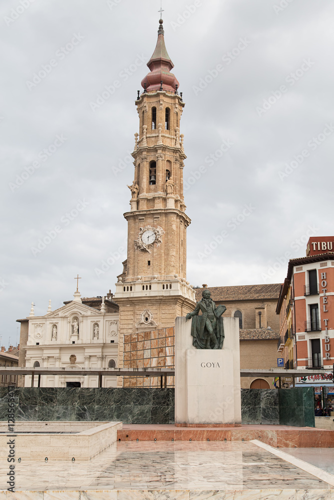 ZARAGOZA, SPAIN - March 30, 2014: Bronze sculpture dedicated to painter Francisco de Goya (by Federico Mares, 1960) at Pilar Square, behind Town Hall and Pilar church.