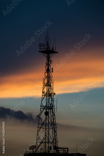 Radio Transmission towers with sunset sky