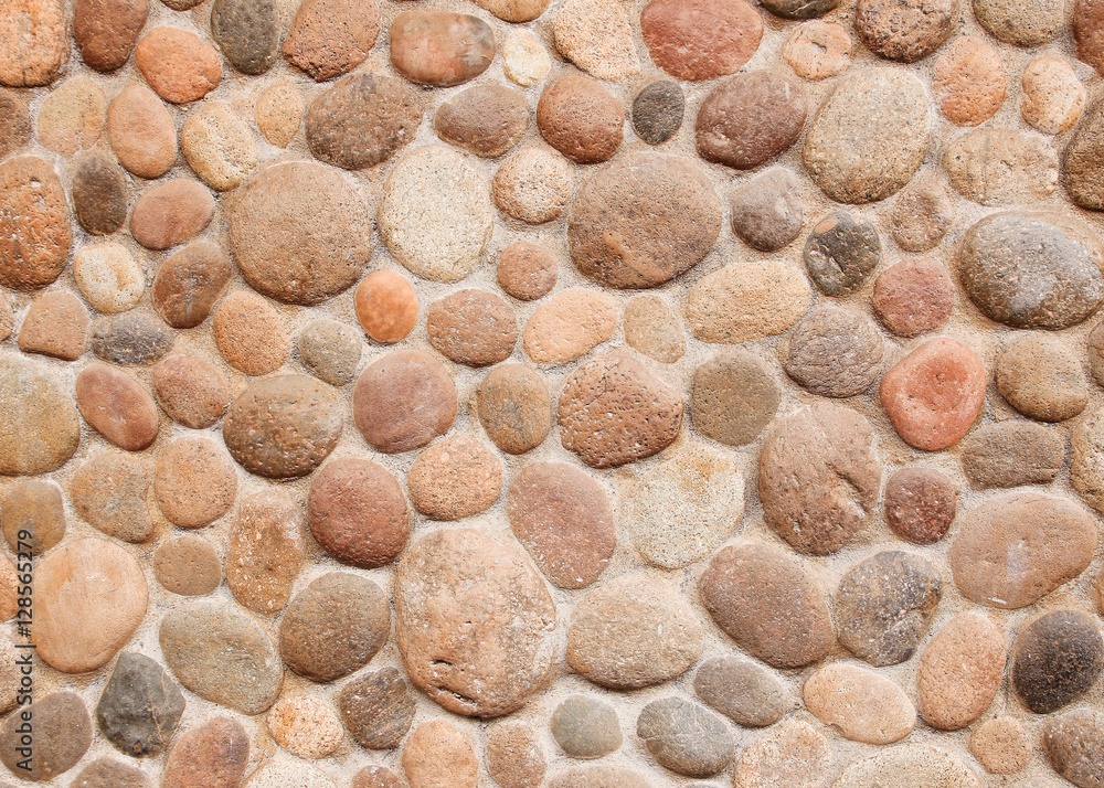Wall round stone rock texture and seamless background Wall round stone rock texture and seamless background