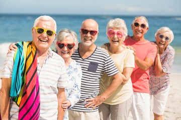 Portrait of senior friends at the beach