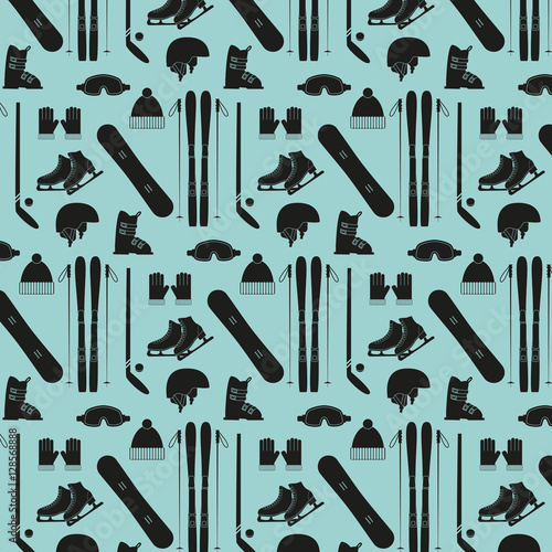 Seamless pattern with winter sports equipment on blue background