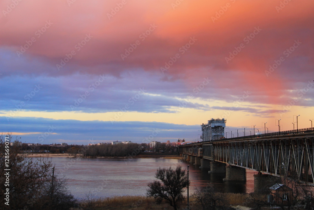 Bridge across river Dnieper at sunset in Kremenchug, Ukraine 