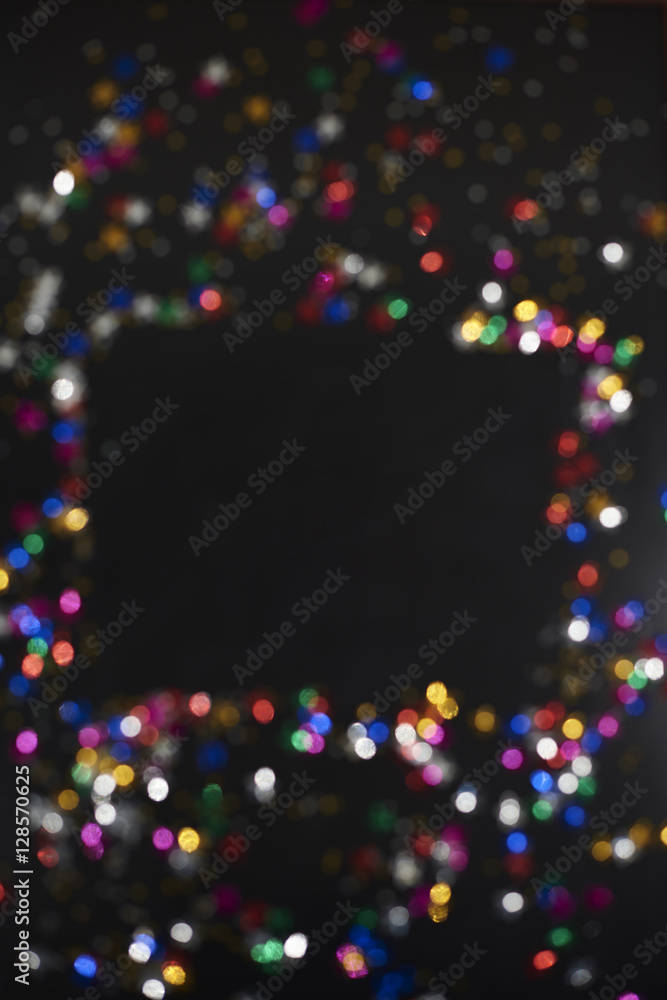 Confetti on the black background Confetti on the black background