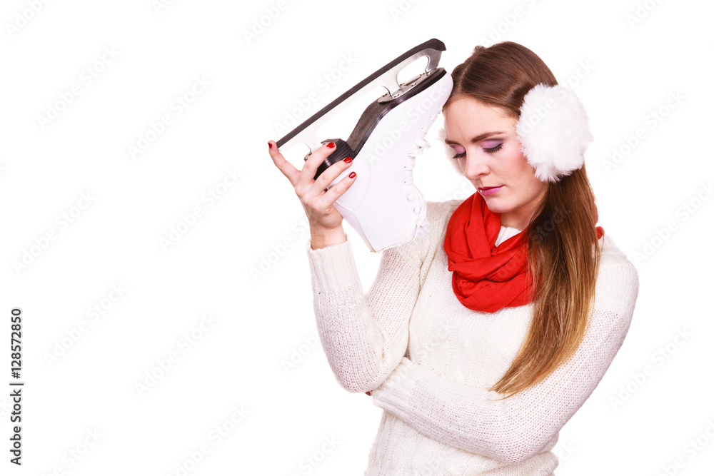Pensive woman with ice skates Pensive woman with ice skates