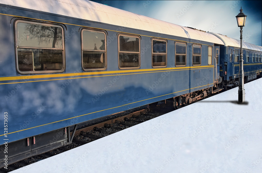 Classic train on snowy platform with lantern in winter Classic train on snowy platform with lantern in winter