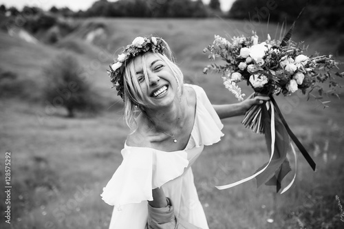 Happy bride in a wreath