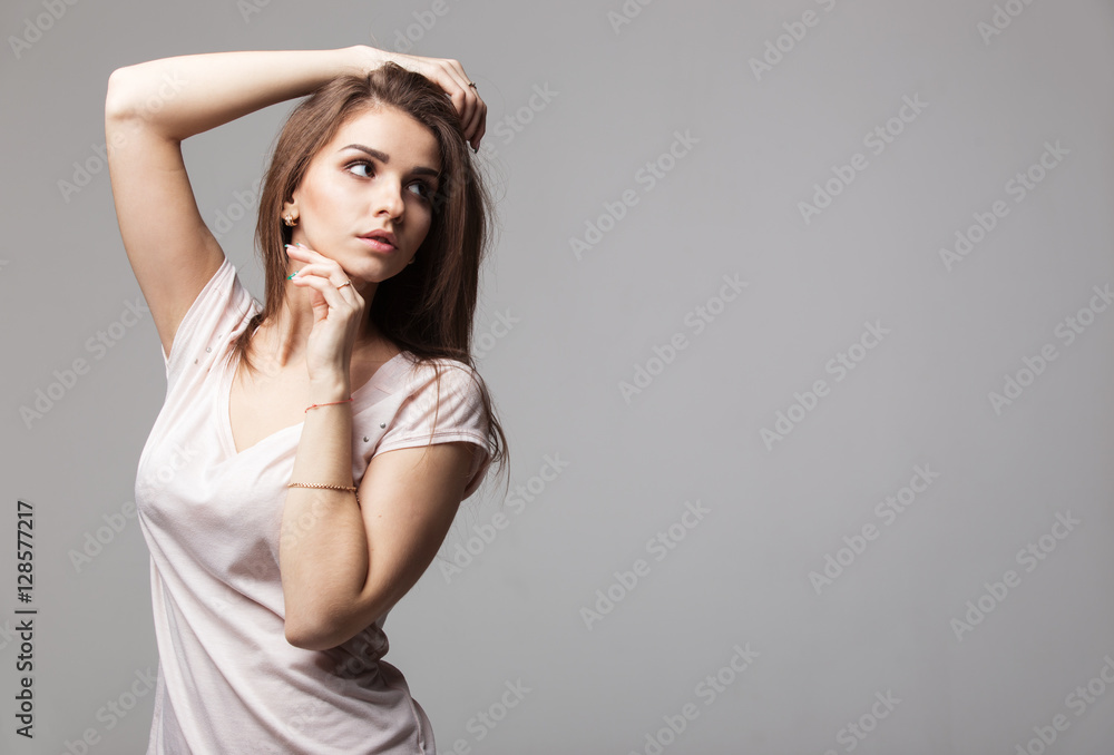 Sensual portrait of beautiful brunette woman posing in studio Sensual portrait of beautiful brunette woman posing in studio
