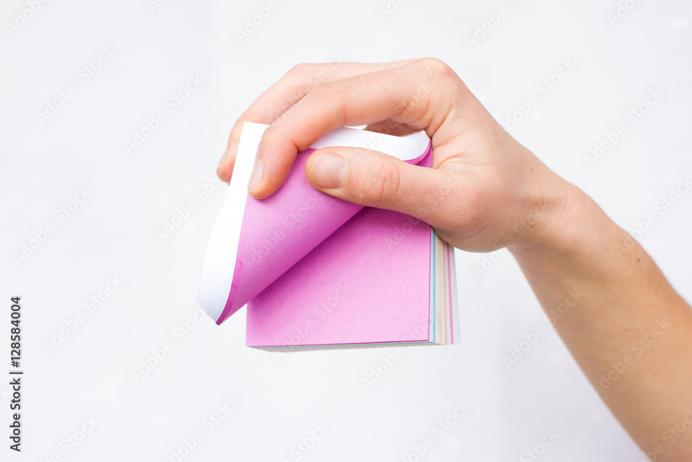 White sheet of paper in woman hands. Advertising White sheet of paper in woman hands. Advertising