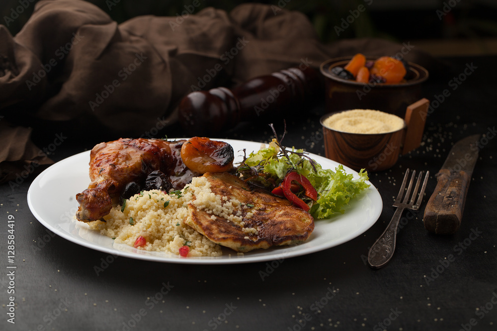 Roast chicken with couscous, spices and dried fruit Roast chicken with couscous, spices and dried fruit