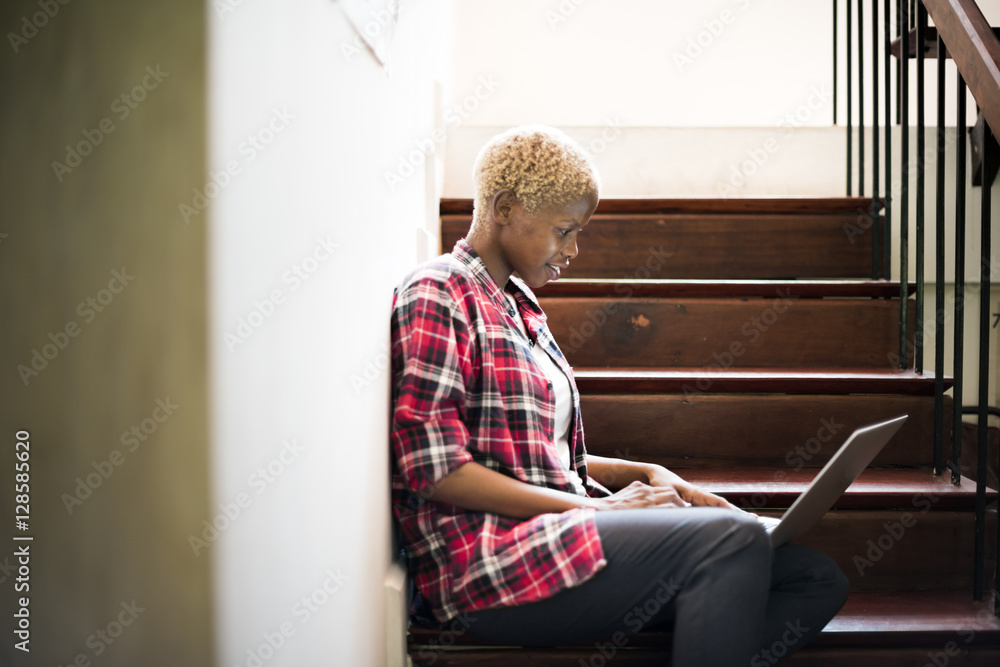 African Woman Laptop Social Networking Stairway Concept
