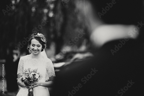Happy bride is walking to the groom for ceremony