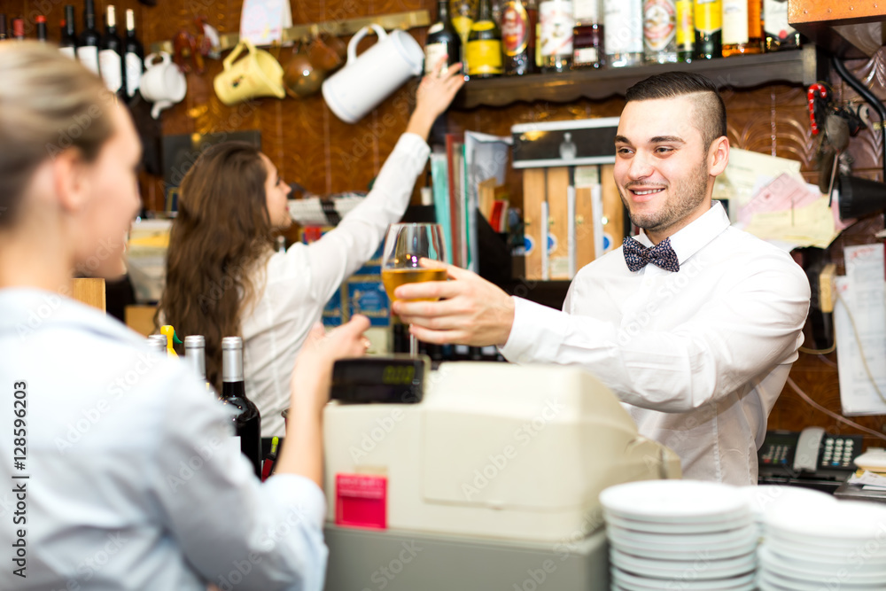 Employees working in a bar