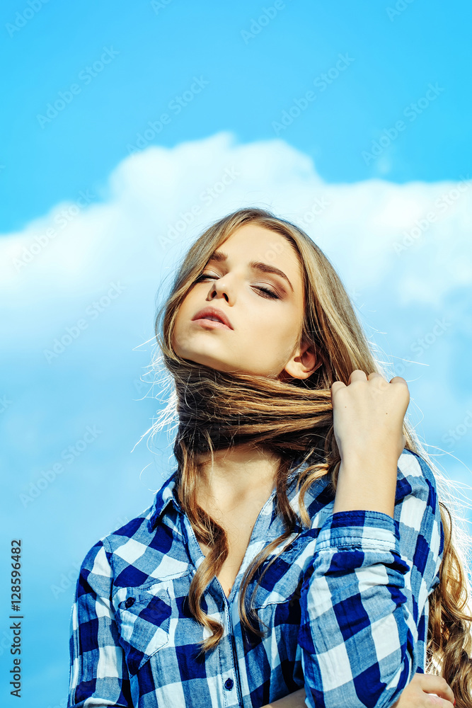 Pretty girl on cloudy sky Pretty girl on cloudy sky