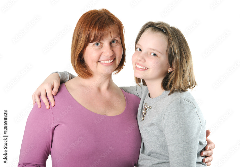 Woman hugging a teenage girl by the shoulders. Woman hugging a teenage girl by the shoulders.