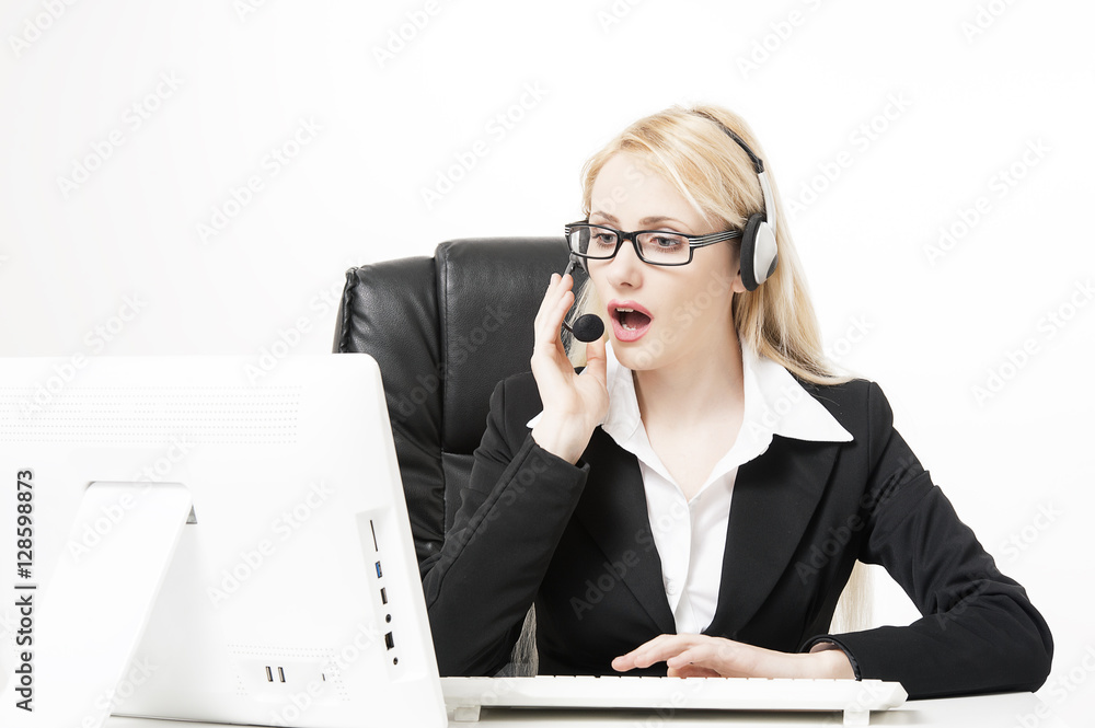 Female office assistant has a call at the office Female office assistant has a call at the office