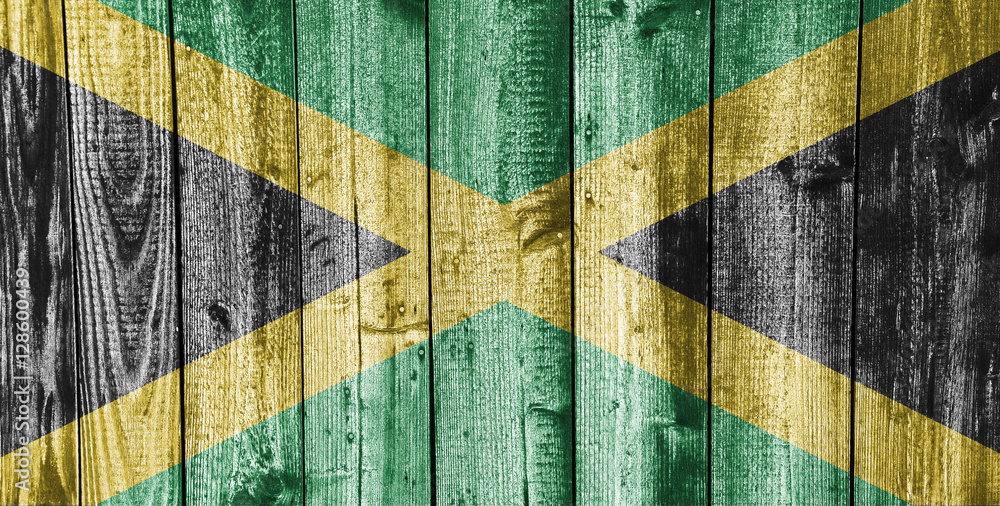 Fahne von Jamaika auf verwittertem Holz