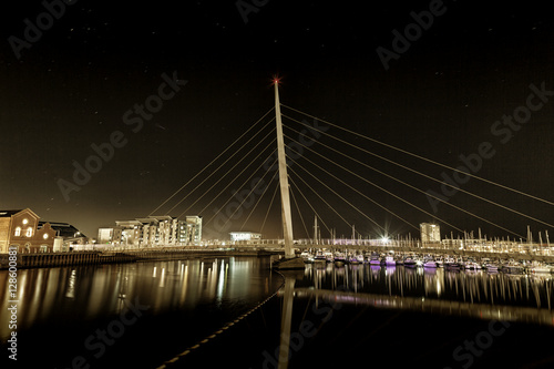 Swansea Sail Bridge Night time at the River Tawe and the Millennium bridge in Swansea