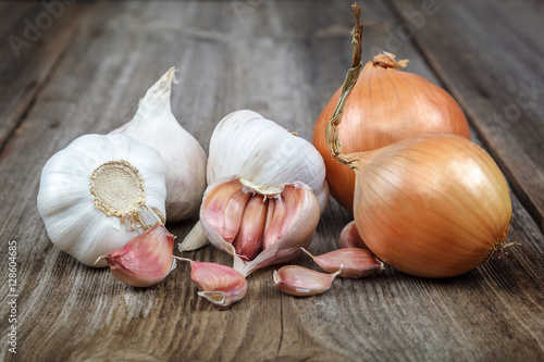 Fresh garlic on a wooden background