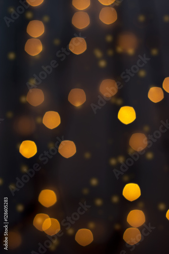 Holiday background - christmas lights on black background