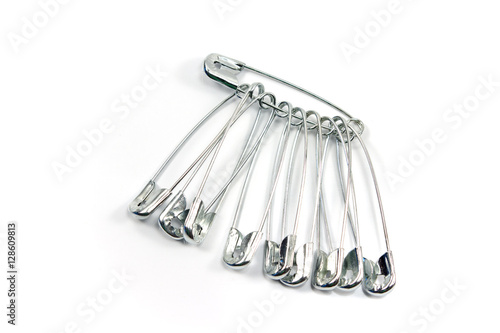 Safety pin isolated on white