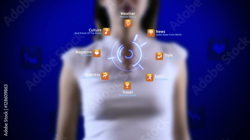 Young female reading a futuristic digital magazine