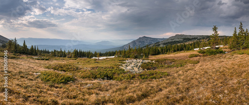 panorama of the Ural mountains in the spring with view of mount Iremel