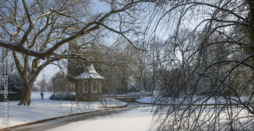 Winter in the park. Wilhelminapark Meppel. Teahouse. Theekoepel. River Reest and bridge. photo