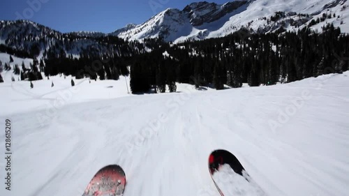 Point of view shot of someone skiing in mountain landscape