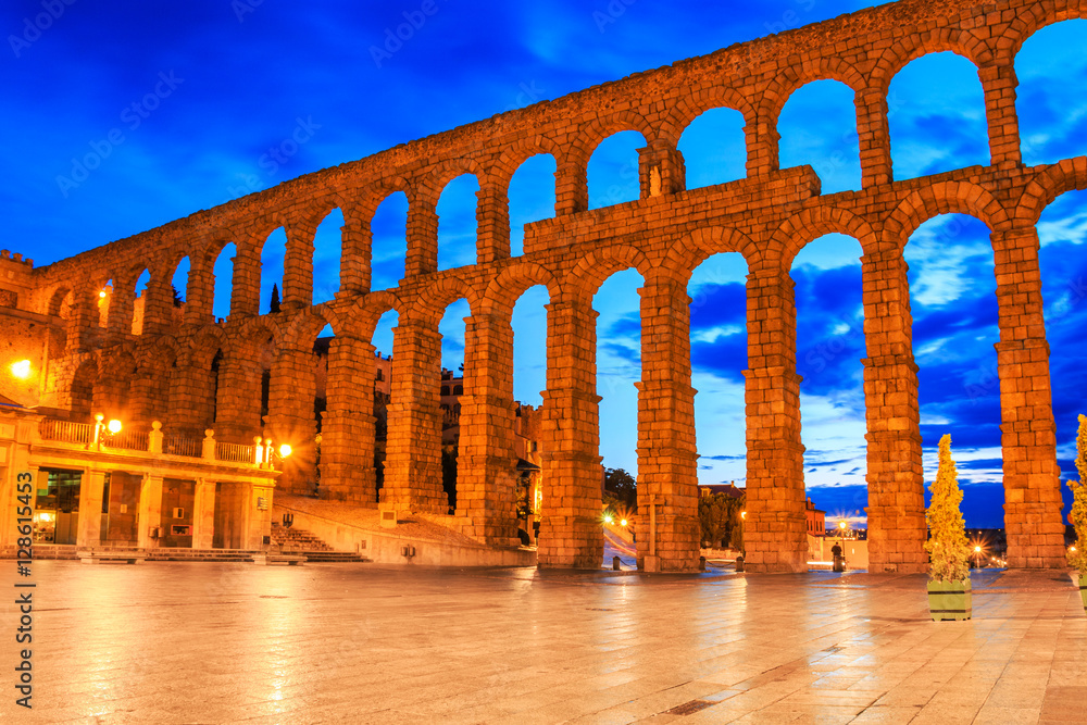 Segovia, Spain. View at Plaza del Azoguejo and the ancient Roman aqueduct. Segovia, Spain. View at Plaza del Azoguejo and the ancient Roman aqueduct.