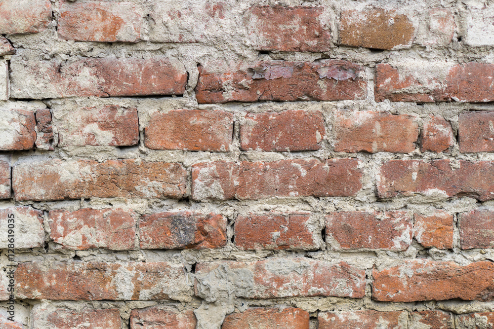 Red uneven brick wall backgroundold. Closeup horizontal Red uneven brick wall backgroundold. Closeup horizontal