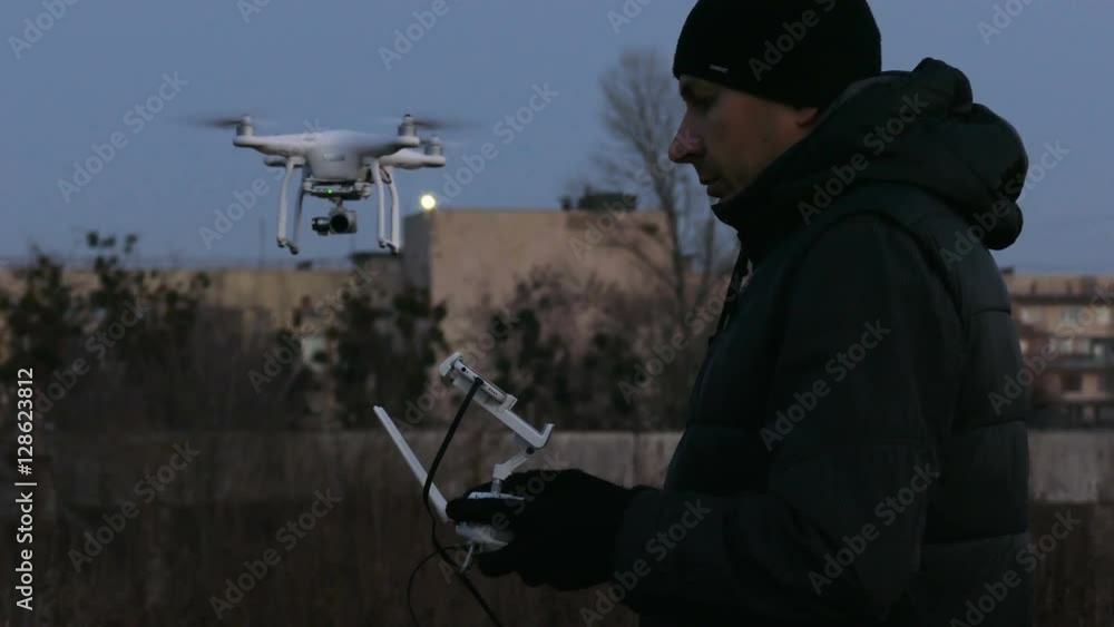 4K.Pilot in gloves with radio transmitter, operate of drone.
4K.Pilot in gloves with radio transmitter, operate of drone.