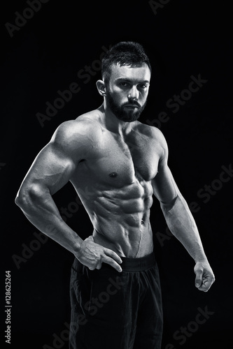 Muscular bodybuilder guy doing posing © nazarovsergey