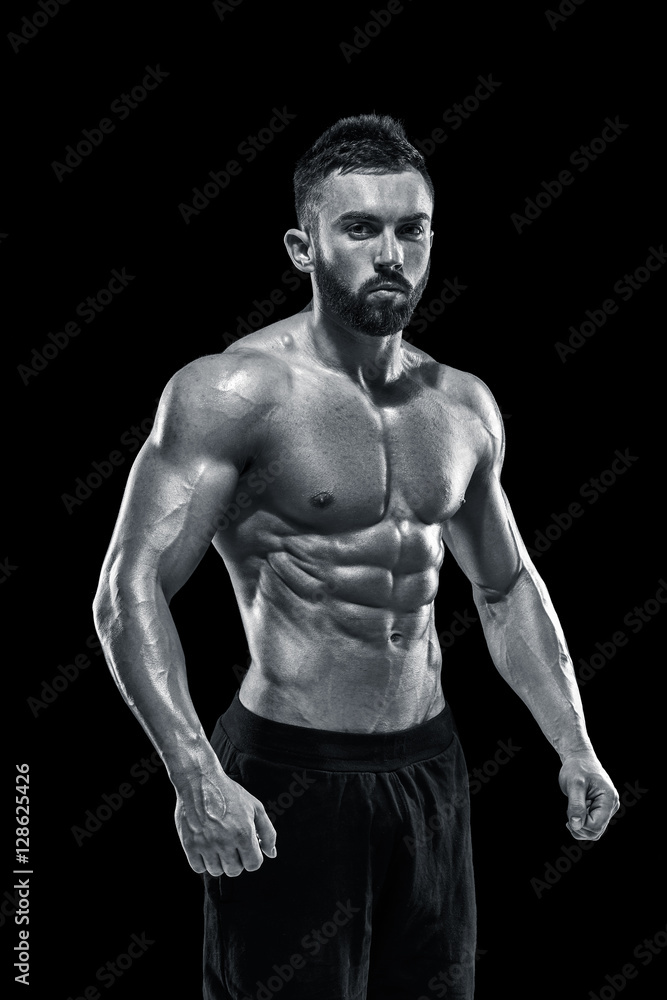 Muscular bodybuilder guy doing posing Muscular bodybuilder guy doing posing