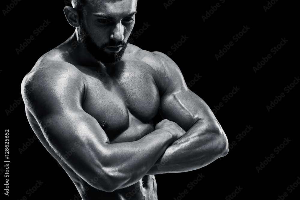 © nazarovsergey - Muscular bodybuilder guy doing posing