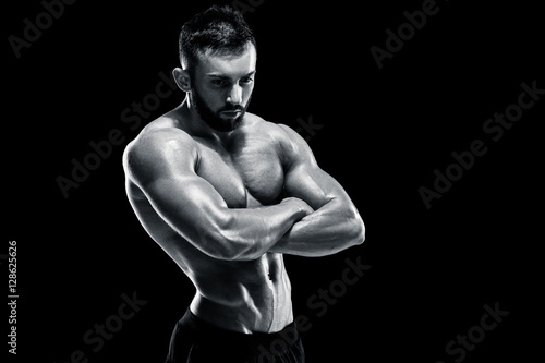 Muscular bodybuilder guy doing posing © nazarovsergey