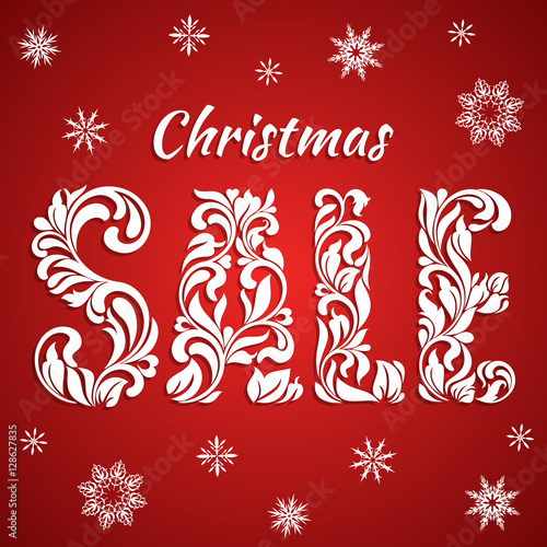 Christmas sale. The Text from a floral ornament on a red background